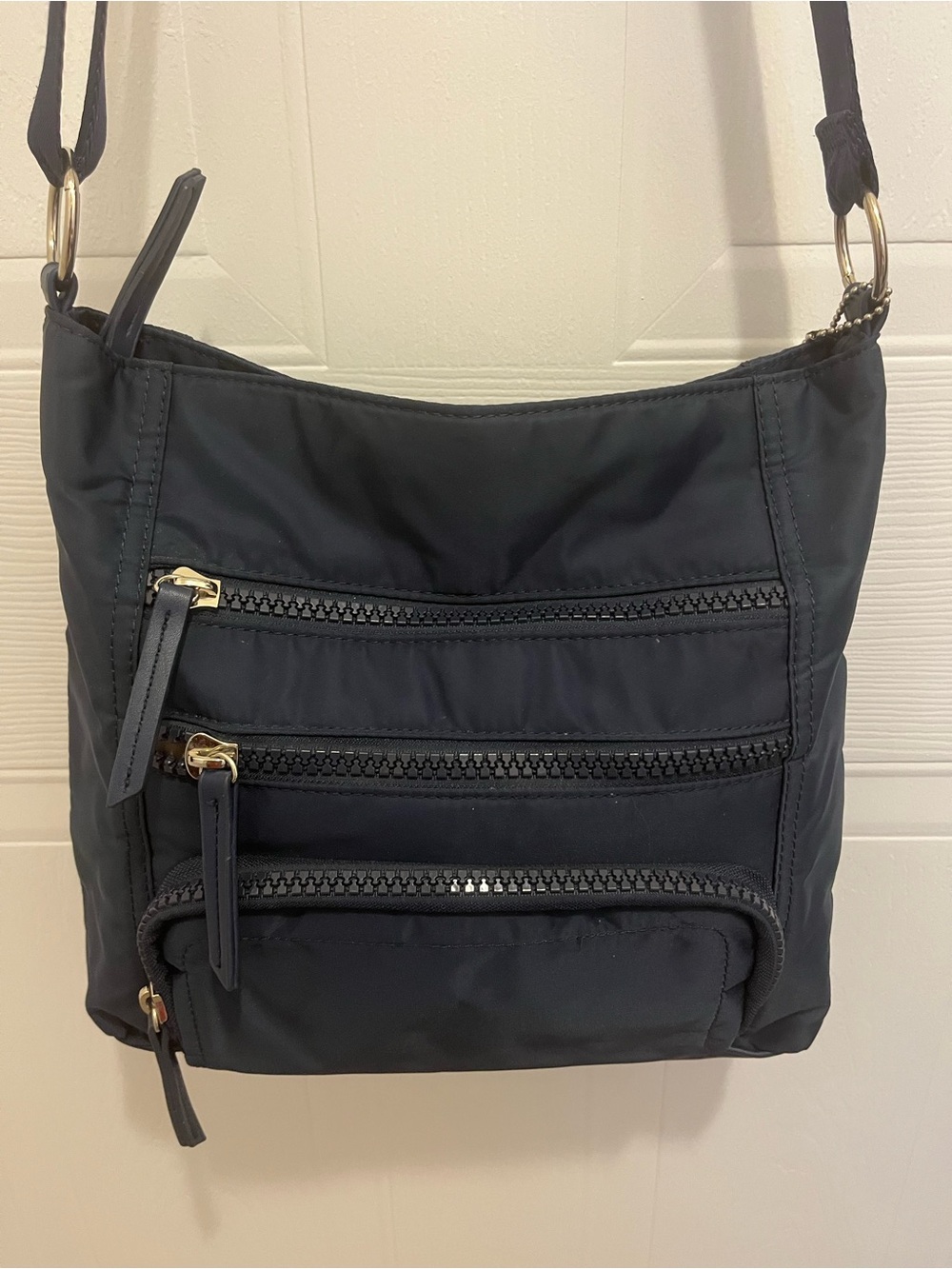 Denver Hayes Navy Blue Crossbody Travel Bag with Built-in Wallet.